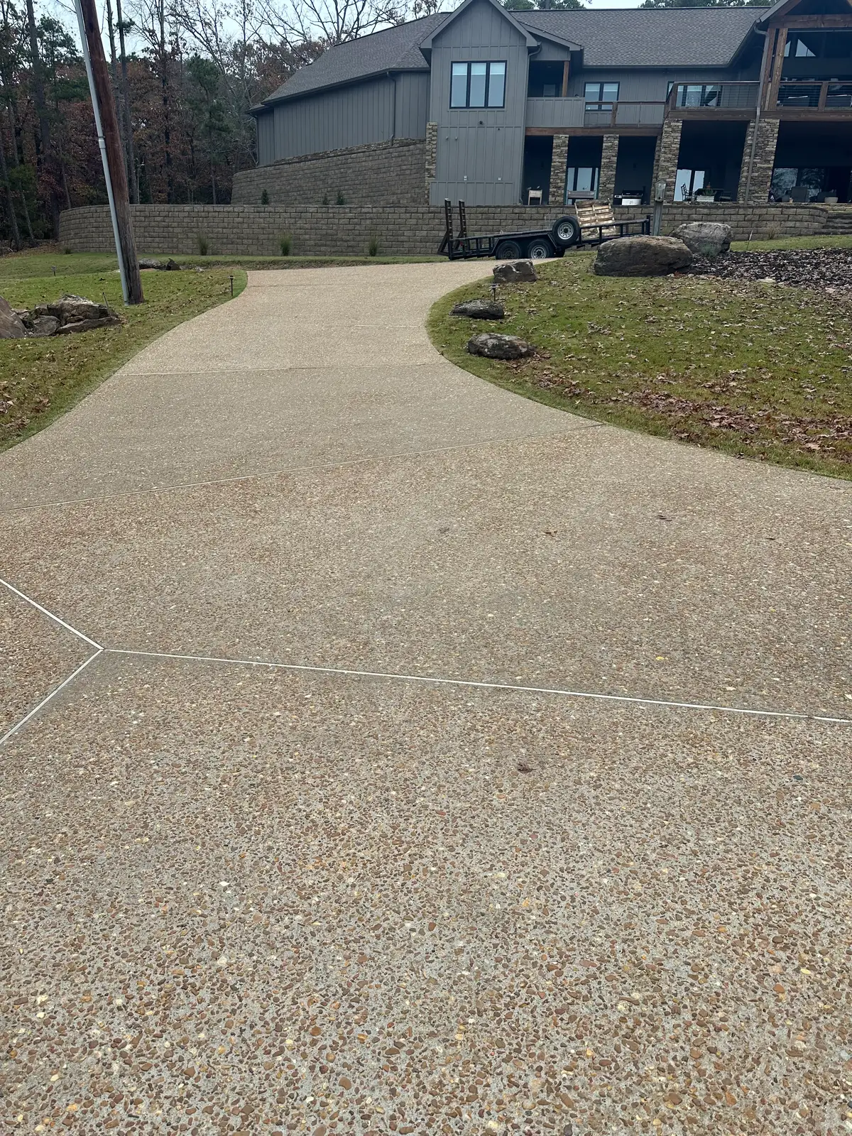 Large residential driveway power washed after years of Central Arkansas service work